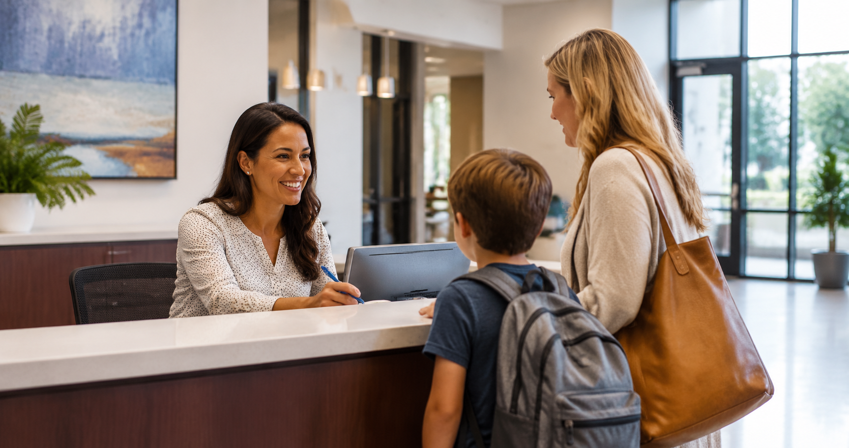 Illustrative photo of a school office staff member helping a family